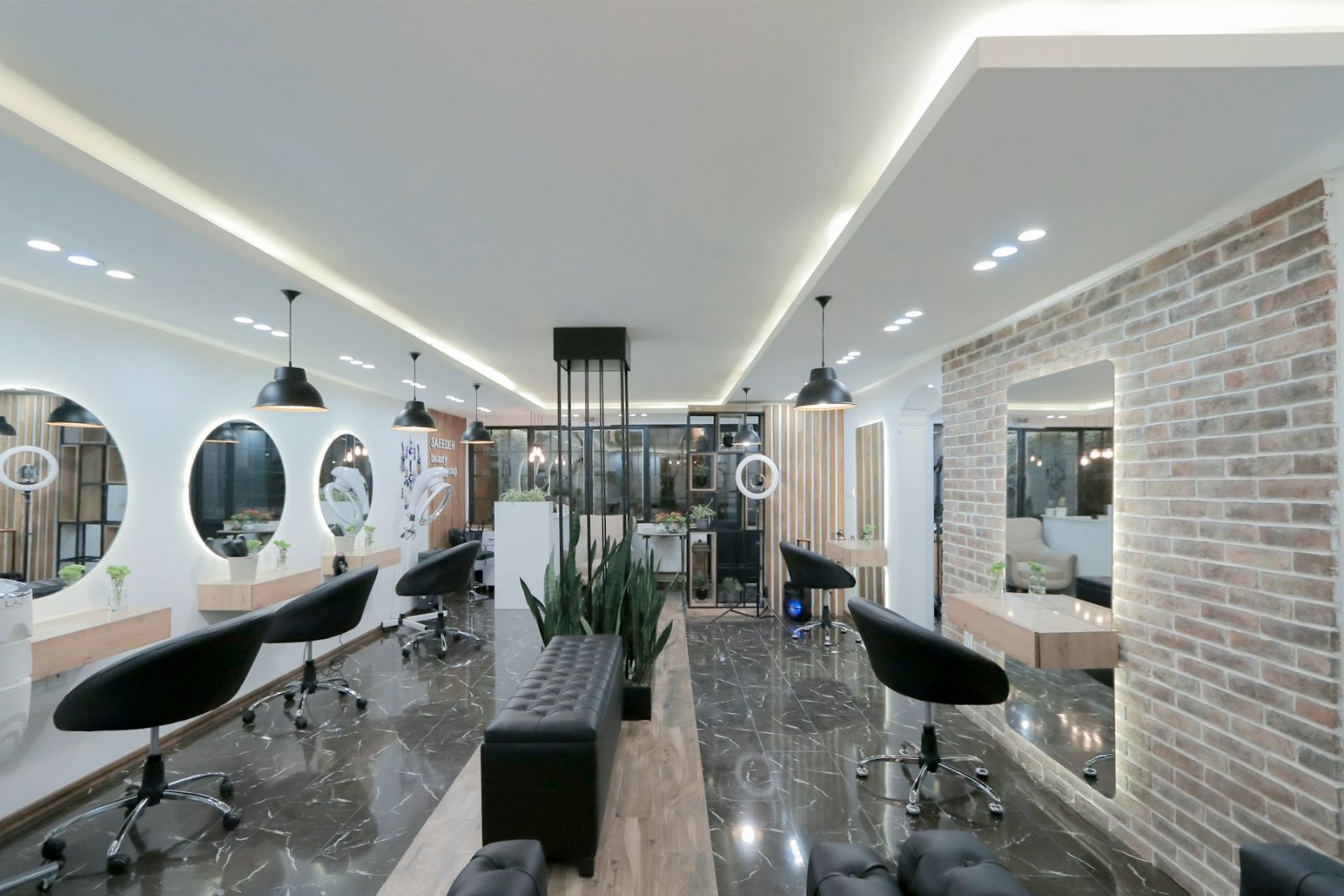 A salon front desk with a ZenSoft point of sale screen